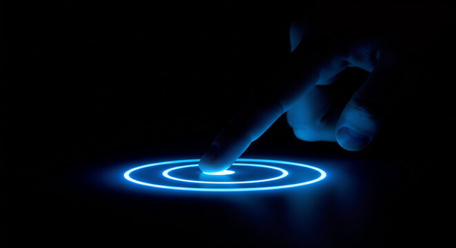 Finger touches glowing blue circle on black