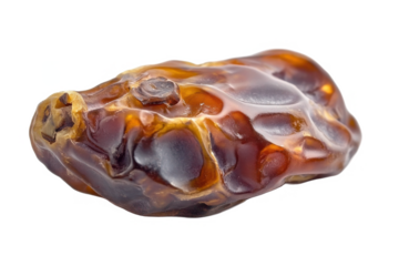 Isolated closeup of a delicious fresh organic medjool date fruit on transparent background