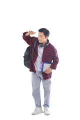 Fototapeta premium portrait of asian male student with backpack, holding books posing on white background, education concept