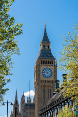 Big ben clock tower rising majestically over london skyline on sunny day