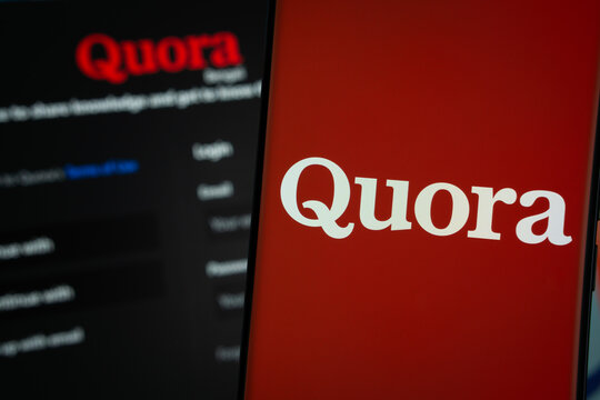 Dhaka, Bangladesh - 18 March 2025: The logo of the Quora is displayed on a smartphone screen, and the website quora is visible on a computer screen in the background.