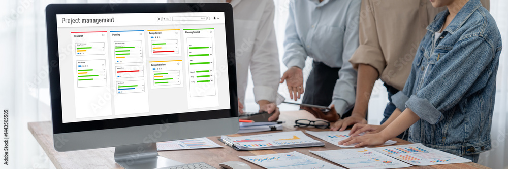 Fototapete project planning software for brisk business project management on the computer screen showing timel