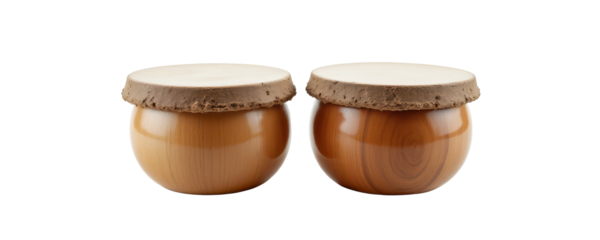 a pair of wooden bongo drums placed on a bright white surface