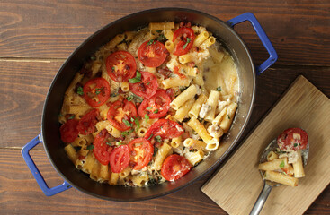 rigatoni casserole with ham, mozzarella cheese and tomatoes
