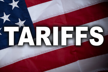 Fototapeta premium Import tariffs increasing, on the background of the American flag