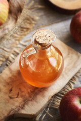 Apple cider vinegar in a glass jug