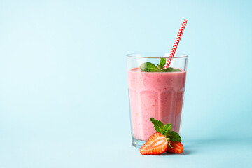 Strawberry smoothie or milkshake on white.