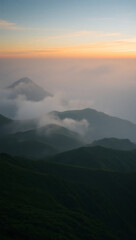 Obraz premium Breathtaking Mountain Vista: Serene Nature Landscape at Sunset in a Majestic Wilderness