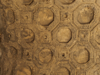 Ornate coffered ceiling with geometric octagonal and square patterns in Uplisthsike cave town in Georgia, highlighting ancient architectural craftsmanship