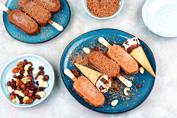 Assorted ice creams on stick.