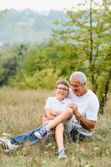 Fototapeta premium loving grandfather and little grandson best friends