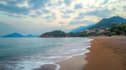 Summer beach, still morning, cloudy.