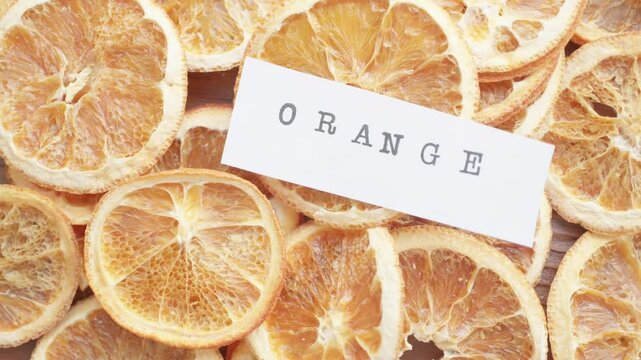 close up of a slice of dried orange	