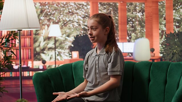 Young girl getting angry at psychologist when reviewing disturbing drawings, showing signs of murder deviant behavior. Teenager with social problems and anger management issues. Camera B.