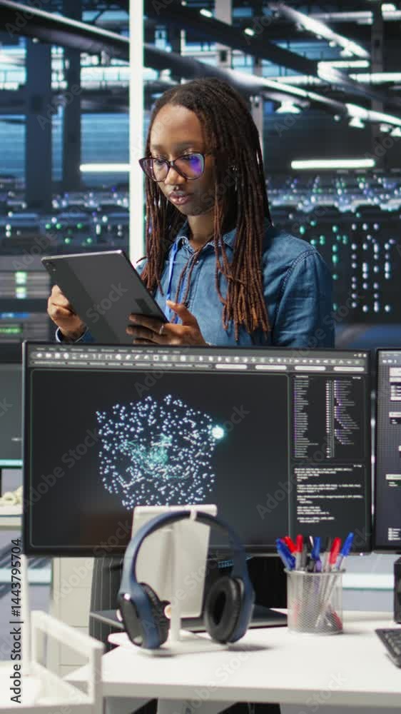 Poster vertical video portrait of upbeat server hub software developer using node tree software to optimize