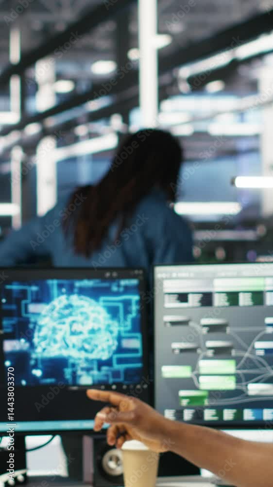 Poster vertical video technician in wheelchair and data center manager using ai node tree software to minim