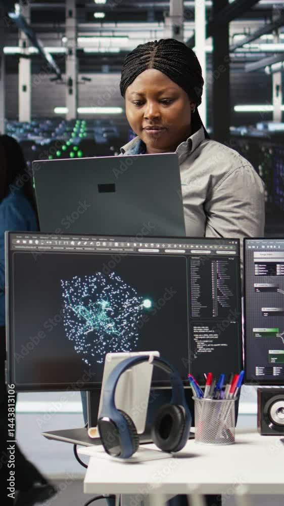 Poster vertical video cheerful data center employee using node tree software to analyze datasets. upbeat se