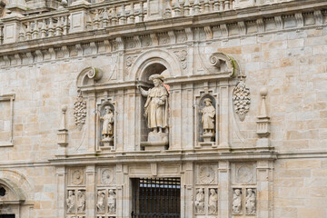 The building has a lot of statues on it