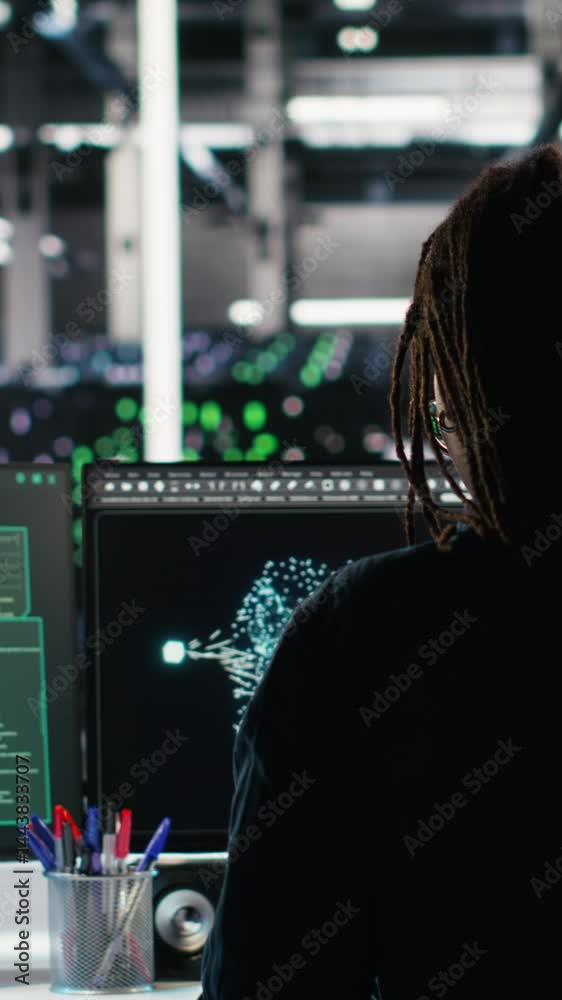 Poster vertical video panicked engineer in ai server facility reacts to hacking incident involving theft of