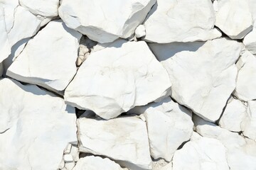 White stone wall texture.  Close up view of  irregularly shaped,  light-colored rocks