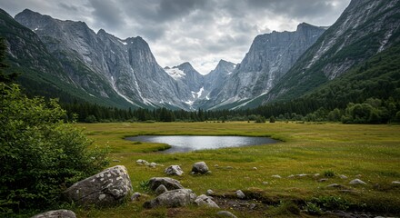 Naklejka premium a mountain range with a lake and mountains in the background