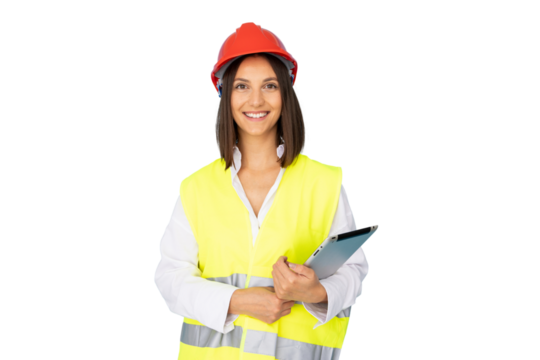 Professional female architect wearing hardhat, safety vest, holding digital tablet, smiling confidently during construction project site management