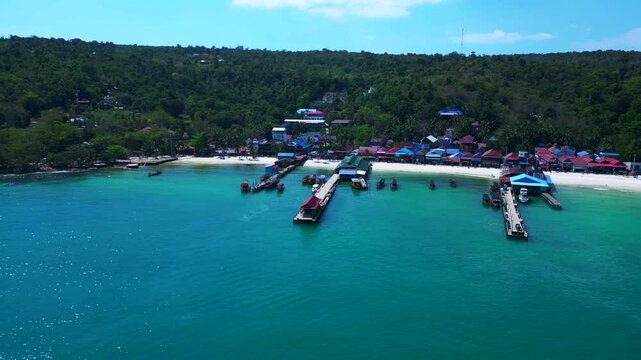 25.2.25 Rong Khm, Island village ferry pier. Dramatic aerial view flight drone