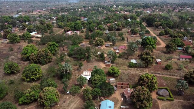 Aerial flight over the countryside of rural Northern Uganda near the South Sudan border.