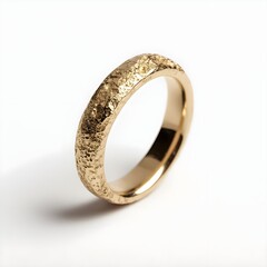 Explore Organic Design with a Pebble Textured Gold Ring Shining on White Background for a Natural Touch