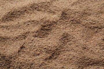 Superfood product. Flaxseed powder as background, closeup