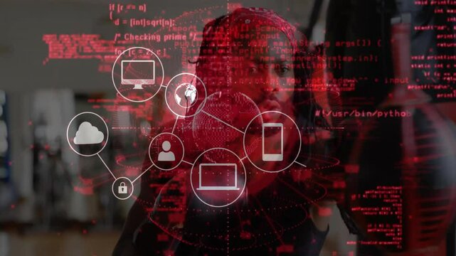 Man wearing VR headset punching in fitness tech studio, showing red code overlay with network icons