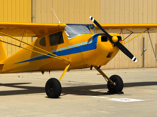 Yellow and Blue Cessna 120
