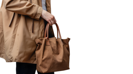 Elegant woman holding bag outdoors in isolation - Fashion and Lifestyle Concept