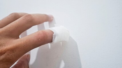 The index finger is exposed or injury on inspection due to a cut wound and festering of the wound...