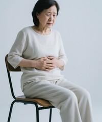 Obraz premium 통증과 고통: 중년 남녀의 허리 디스크 및 관절염 Pain and Suffering: Lumbar Disc Herniation and Arthritis in Middle-Aged Men and Women