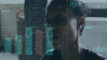 woman analyzing financial data in tech loft, displaying digital bar graphs and currency symbols - Powered by Adobe
