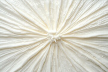 Close-up view of a radiating white fabric texture.