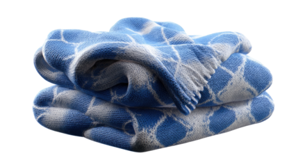 Cozy Blanket: A close-up captures the soft texture and vibrant hues of a folded blanket, inviting warmth and comfort, offering a tactile feast for the eyes. 