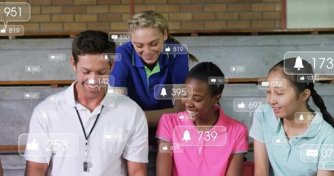 Education coach sitting with teenage students on bleachers, displaying floating social media icons