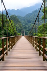 Wooden suspension bridge spanning lush green valley