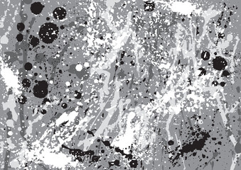 灰色ベースに白や黒のインクの飛沫をかけた背景