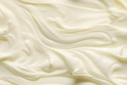 Creamy vanilla ice cream swirls seamless pattern. Smooth texture of soft serve dessert. Dairy product background for packaging design, menu, or advertisement. Sweet food concept.