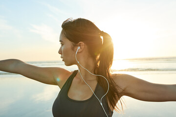 Nature, yoga and woman in warrior pose for posture, wellness or holistic health for calm soul. Relax, beach or zen female person stretching arms for mindfulness, chakra balance or peace for awareness