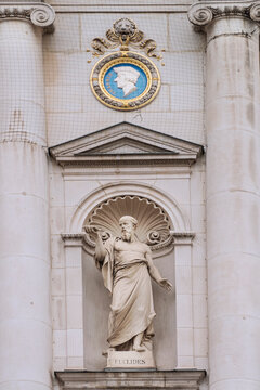 uclides statue, The Mathematician,  in old building's facade in Vienna, Austria, 2020