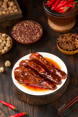 Spicy duck head is a marinated dish using traditional Chinese spices and is a popular street food.