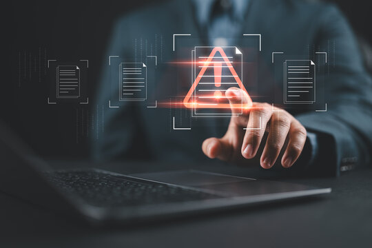 Businessman with laptop with data information privacy and document management hacking and spam warning symbol. cyber attack network, virus, spyware, Cyber security and cybercrime.