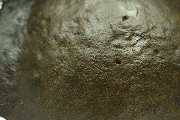 brown chocolate cake bake on aluminum foil paper