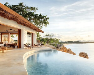 Fototapeta premium Oceanfront infinity pool villa with stunning views