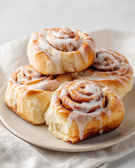 Homemade cinnamon rolls with sweet cinnamon sugar and biscoff swirl topped with light creamy vanilla glaze served soft and fluffy for a comforting treat

