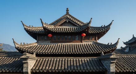 Naklejka premium Traditional Asian Architecture with Tile Roofs and Red Lanterns